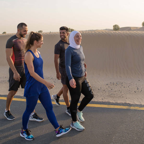 Fitness First members walking in the desert Fitness First members walking in the desert