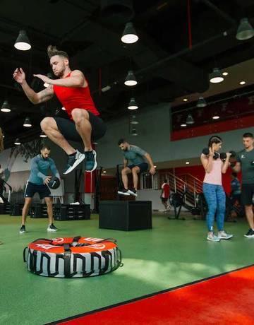 Fitness First members while performing multiple types of exercises Fitness First members while performing multiple types of exercises