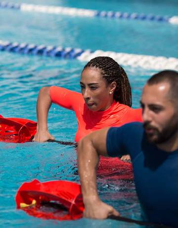 fitness first members during a group water exercise