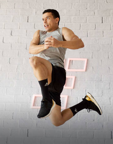 fitness first member jumping in a martial arts class fitness first member jumping in a martial arts class