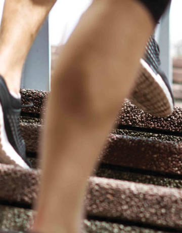 athletes running upstairs