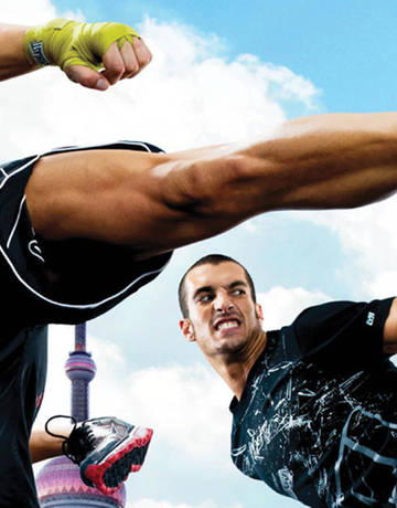 Gym member performing back kick